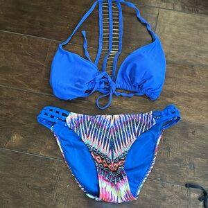 Electric blue bikini with chain top.